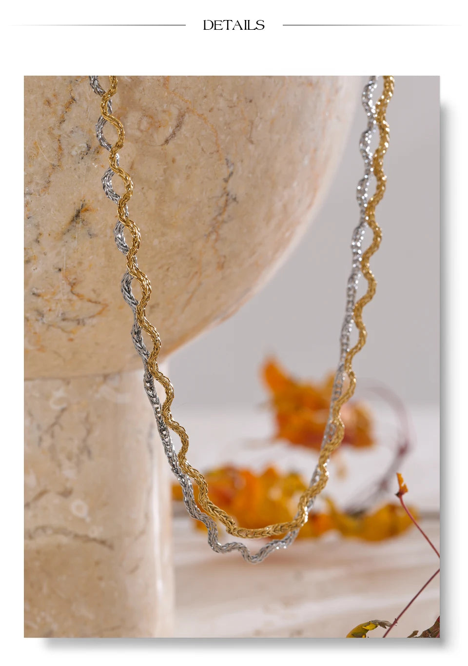 Geometric chain necklace in gold-plated stainless steel.