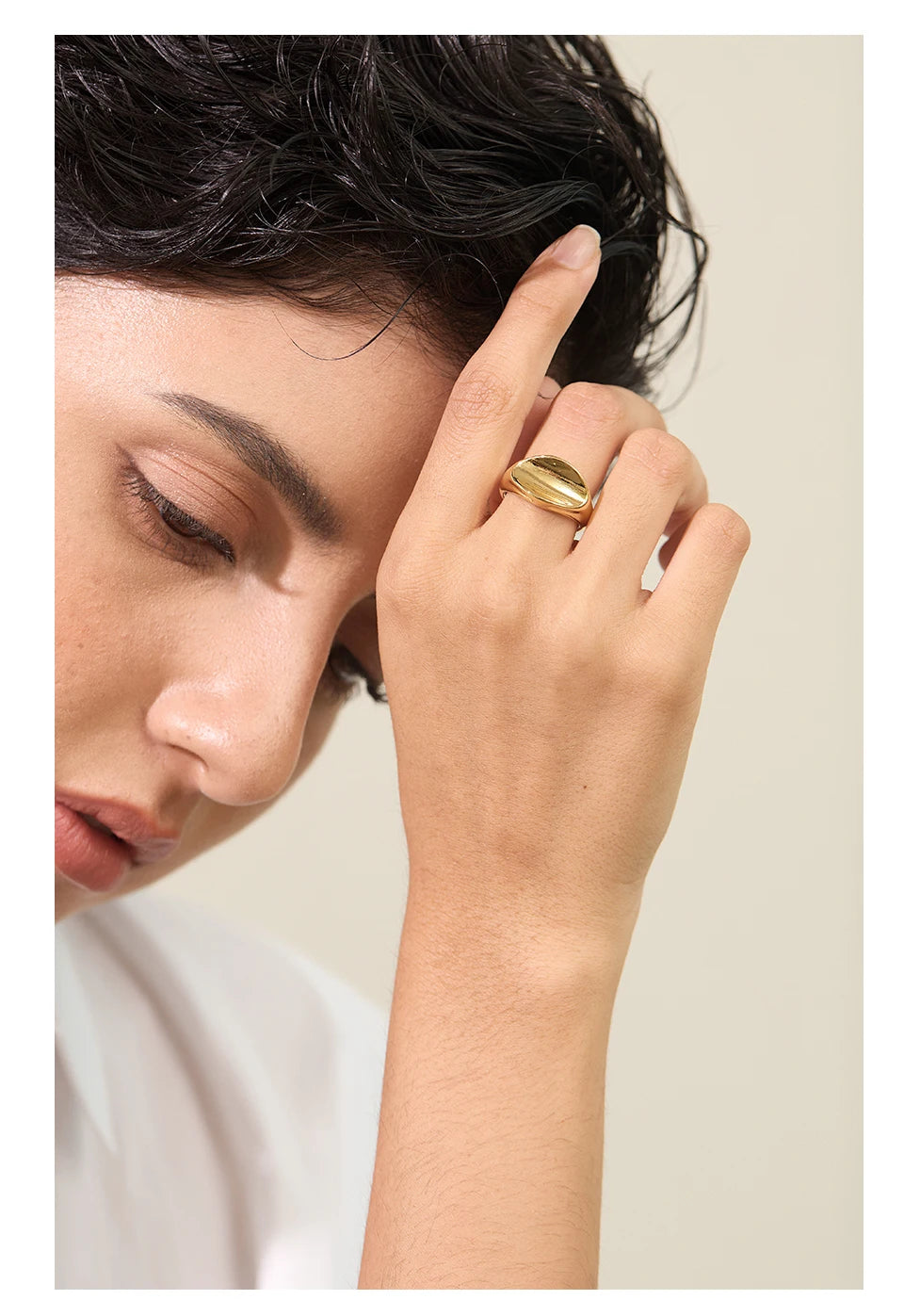 Geometric ring in gold-plated stainless steel.