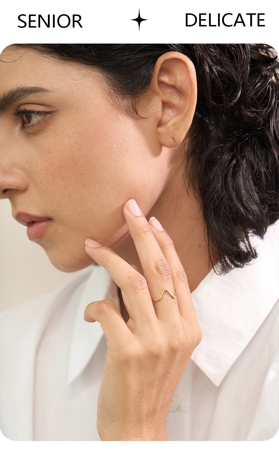 Cubic zirconia geometric ring in 18K gold-plated stainless steel with cubic zirconia.