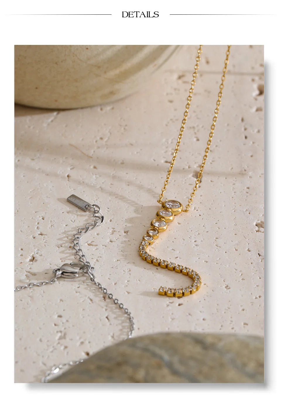 Cubic zirconia geometric necklace in gold-plated stainless steel with cubic zirconia.