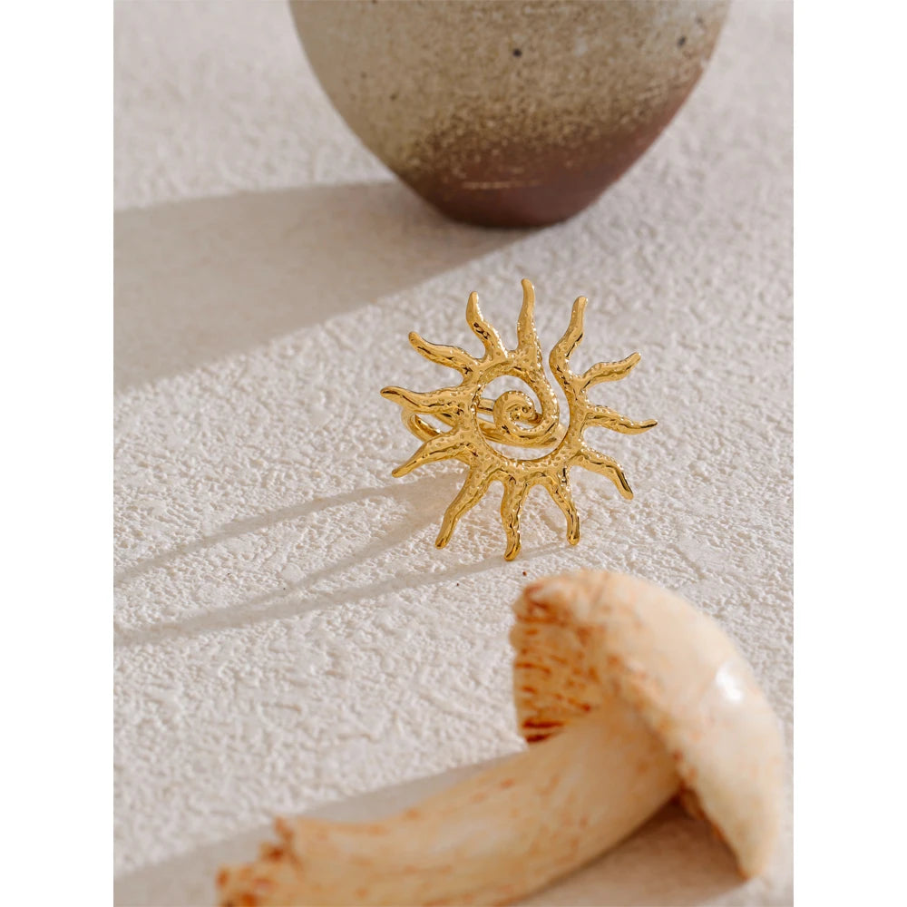 Sun geometric ring in 18K gold-plated stainless steel.