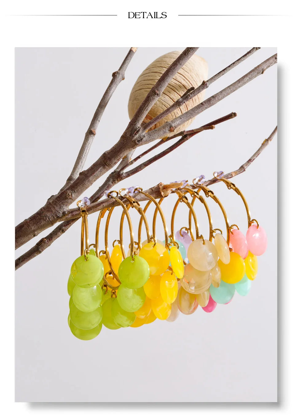 Resin multi-color geometric earrings in gold-plated stainless steel with resin.