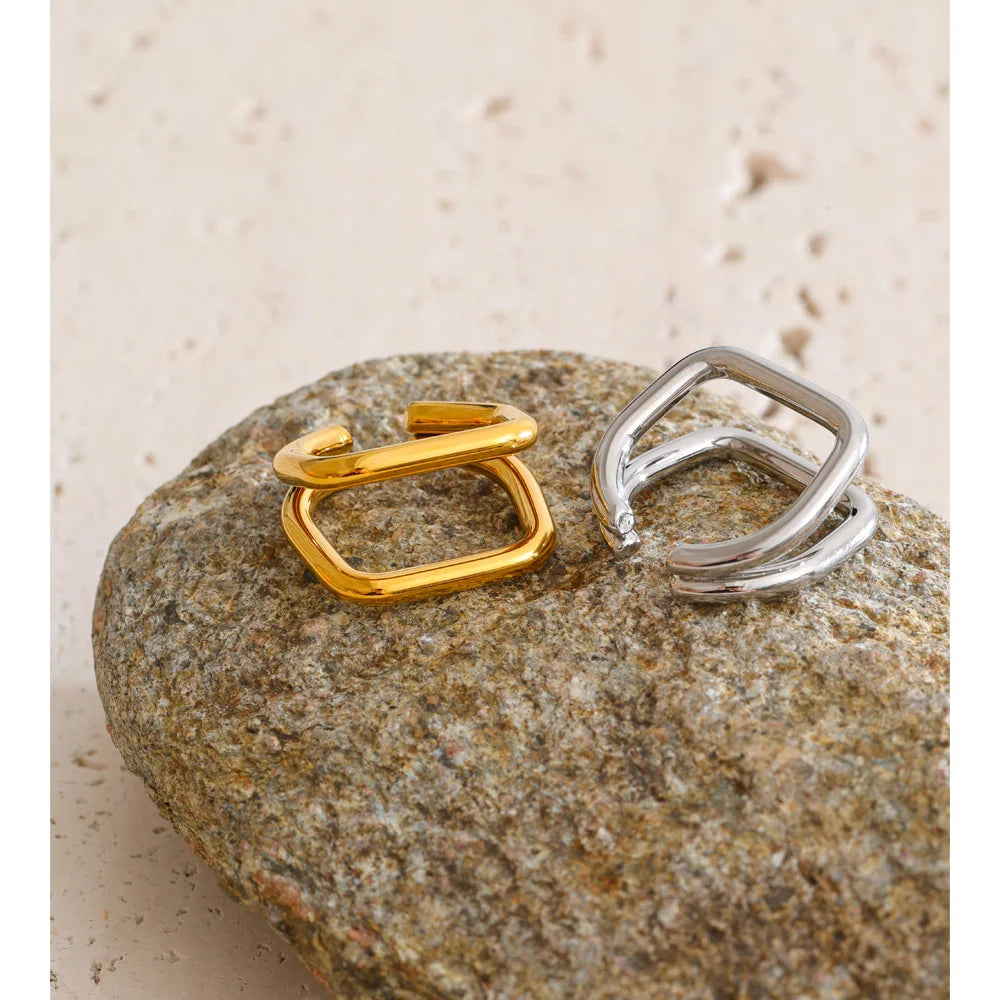 Geometric ring in 18K gold-plated stainless steel.