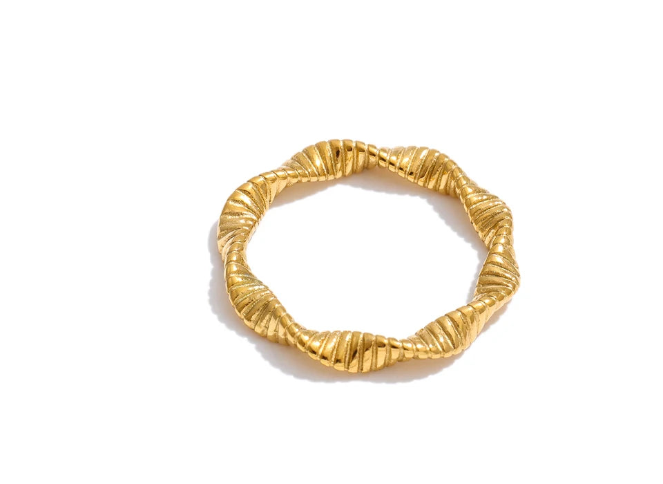 Geometric ring in 18K gold-plated stainless steel.