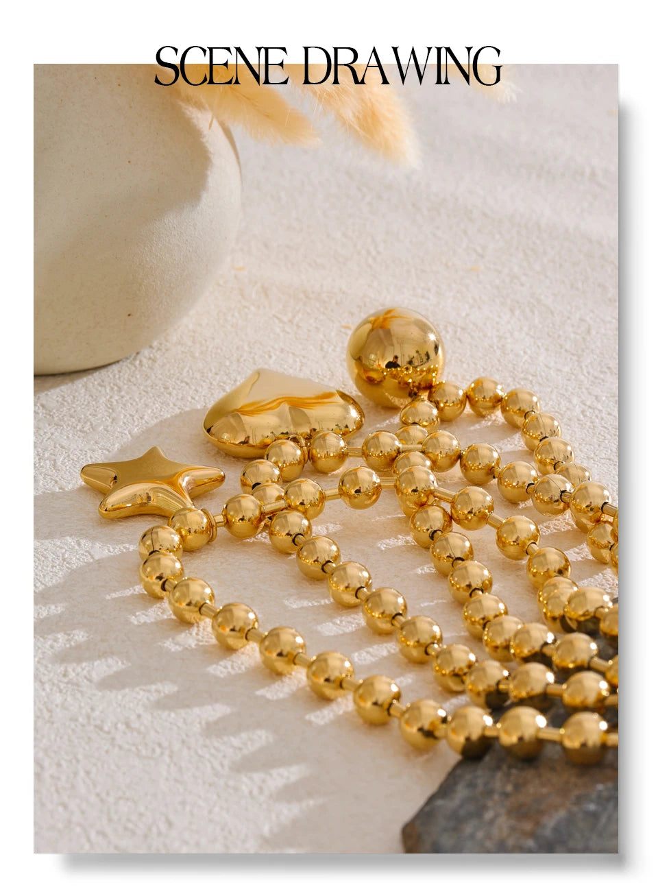 Heart star beaded necklace in gold-plated stainless steel.