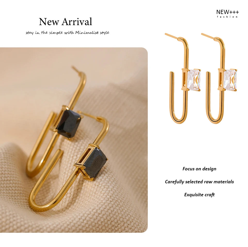 Black cubic zirconia geometric earrings in 18K gold-plated stainless steel with cubic zirconia.