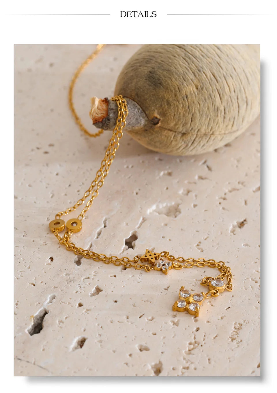 Cubic zirconia flower necklace in gold-plated stainless steel with cubic zirconia.