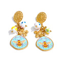 Flower earrings in gold-plated stainless steel.