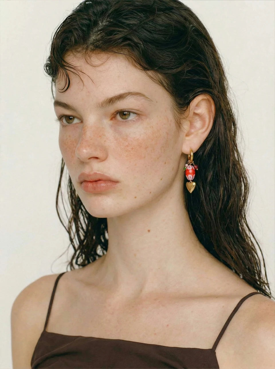 Red heart earrings in gold-plated stainless steel.