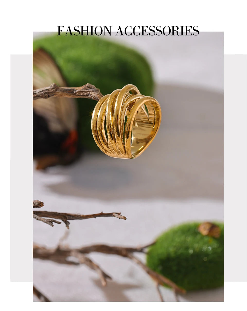 Geometric ring in 18K gold-plated stainless steel.