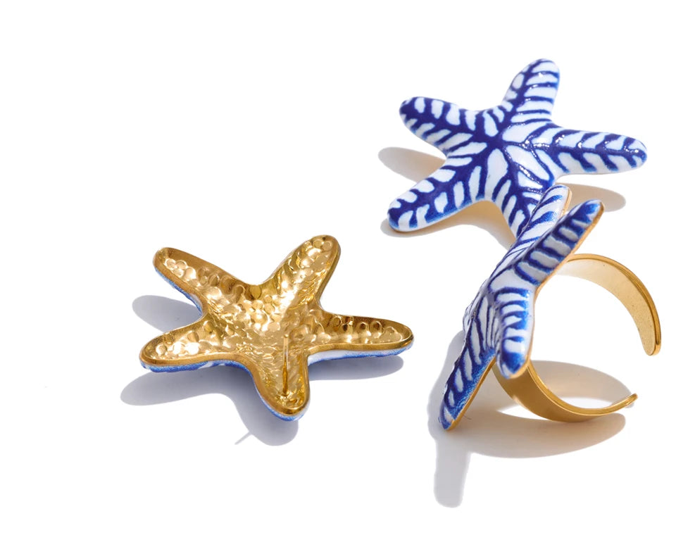 Blue star geometric earrings in gold-plated stainless steel.