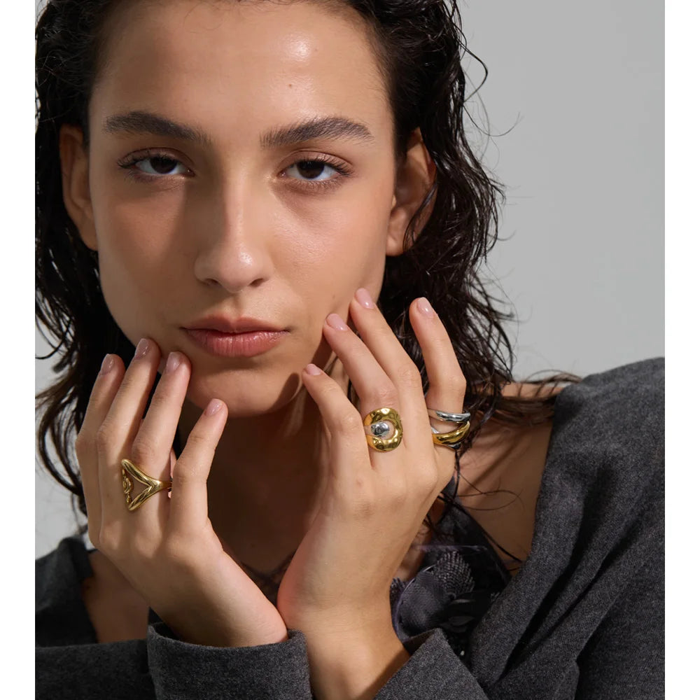 Geometric ring in 18K gold-plated stainless steel.