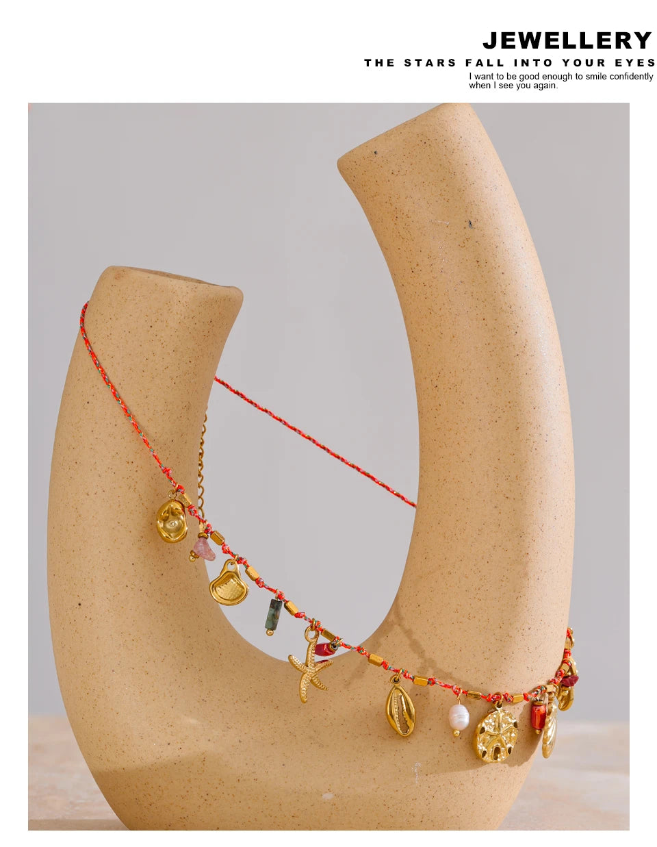 Shell natural stone star necklace in gold-plated stainless steel with natural stone and shell.