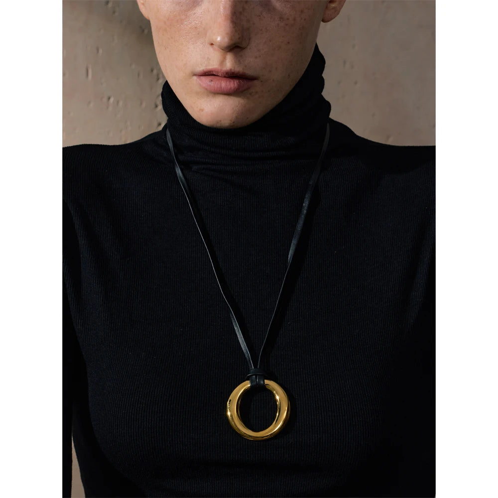 Coin geometric necklace in gold-plated stainless steel.