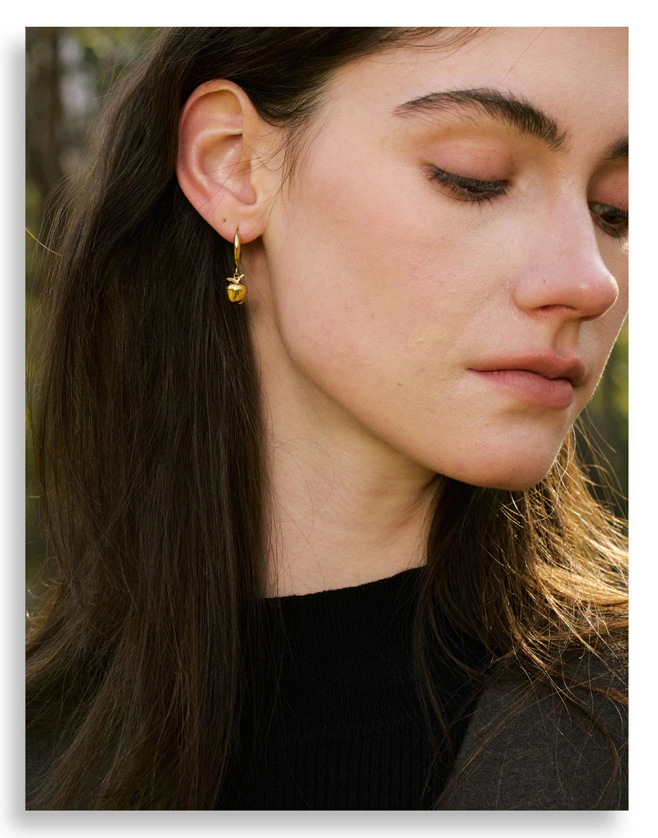 Geometric earrings in gold-plated stainless steel.