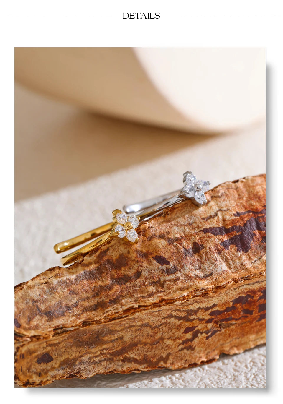 Cubic zirconia flower ring in gold-plated stainless steel with cubic zirconia.