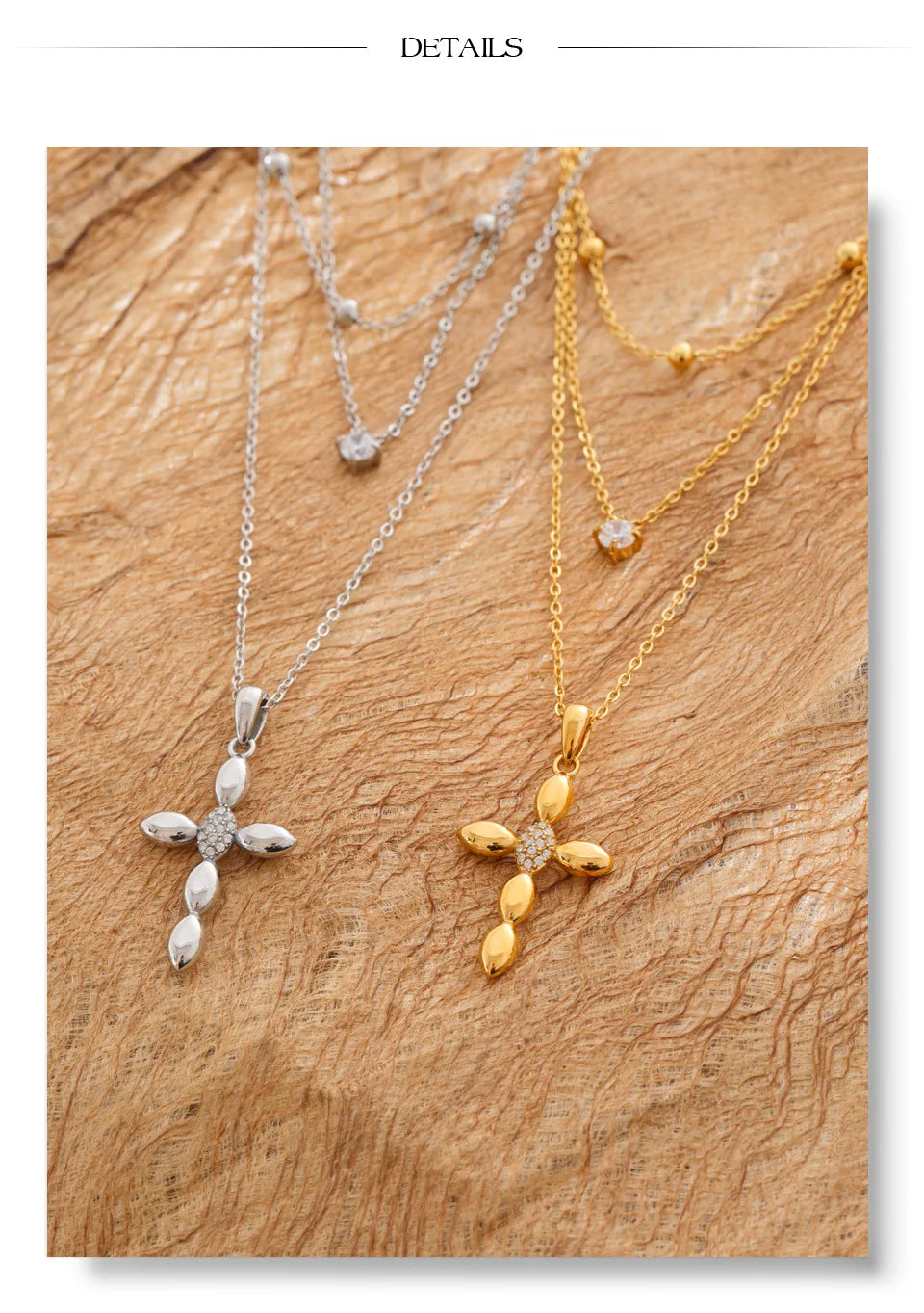 Cubic zirconia cross chain necklace in gold-plated stainless steel with cubic zirconia.