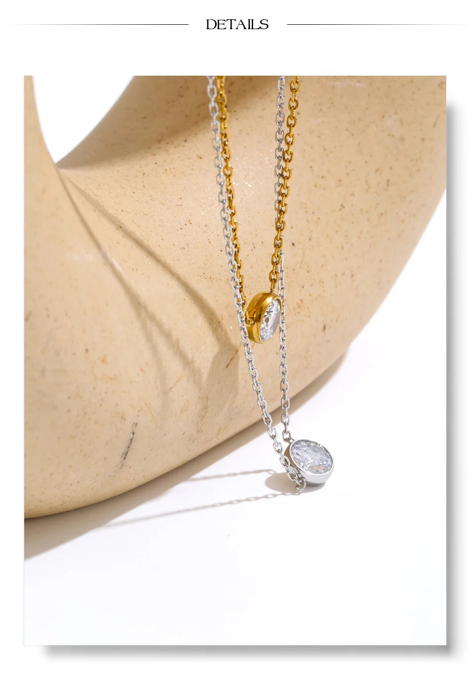Cubic zirconia geometric necklace in gold-plated stainless steel with cubic zirconia.