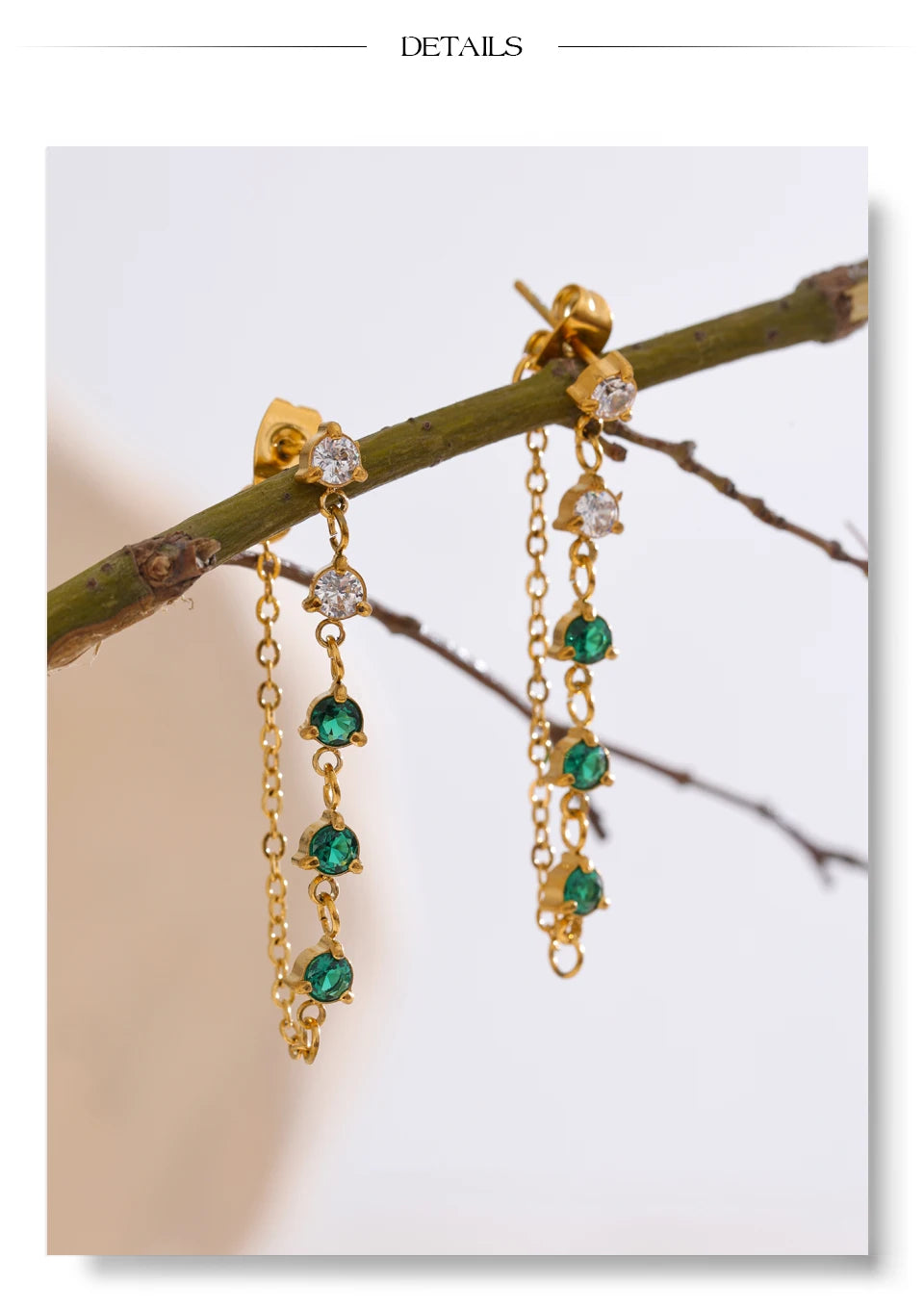 White cubic zirconia geometric earrings in gold-plated stainless steel with cubic zirconia.