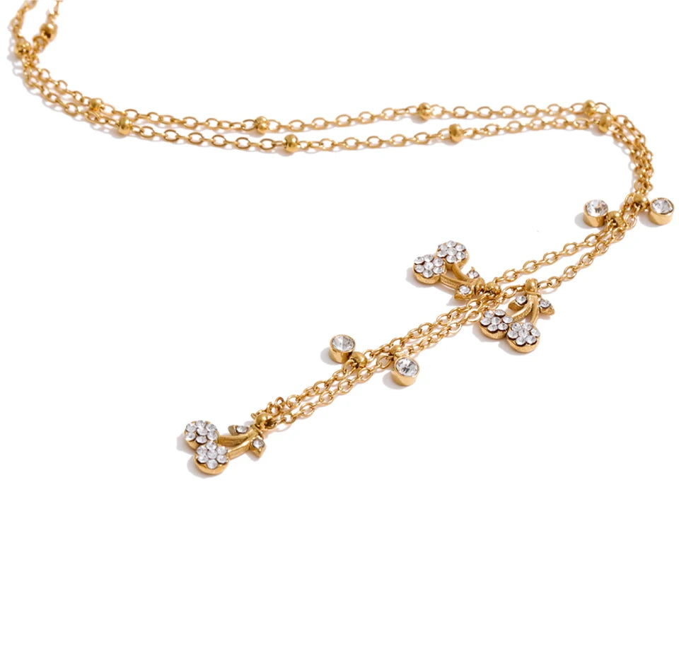 Cubic zirconia geometric necklace in gold-plated stainless steel with cubic zirconia.