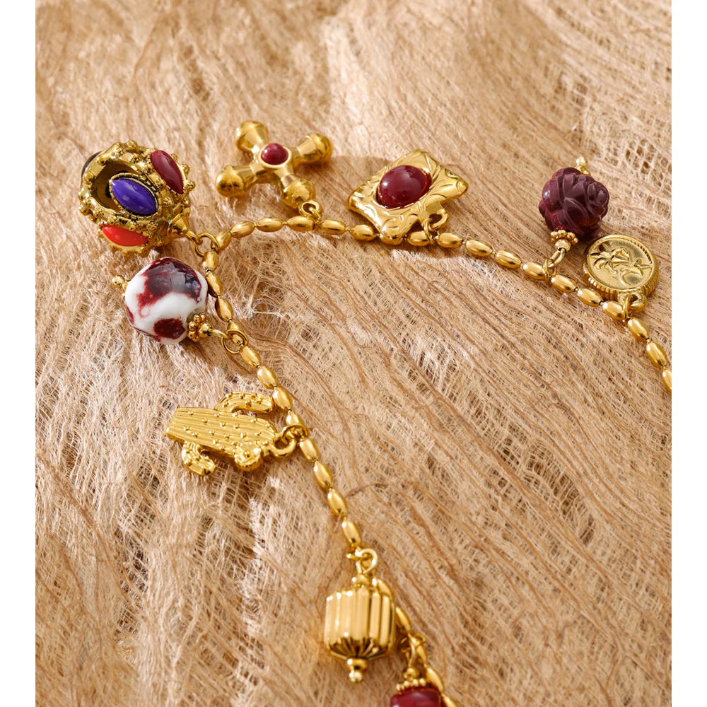 Resin acrylic cross necklace in gold-plated stainless steel with resin and acrylic.