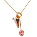 Resin geometric necklace in gold-plated stainless steel with resin.