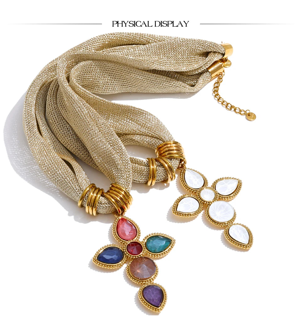 White glass cross necklace in gold-plated stainless steel.