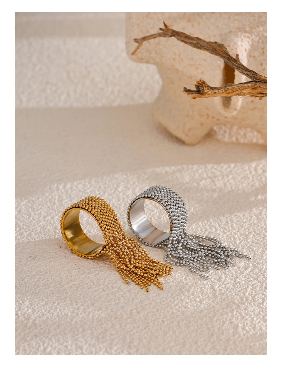 Geometric chain ring in 18K gold-plated stainless steel.