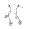 Geometric chain earrings in gold-plated stainless steel.