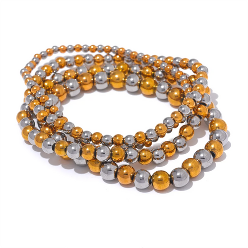 Bracelet made of gold-plated stainless steel beads.
