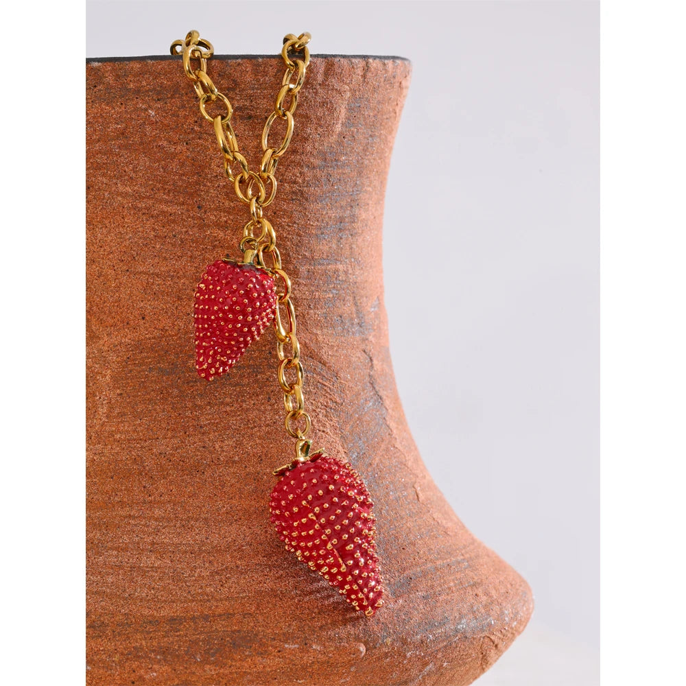 Red heart geometric necklace in gold-plated stainless steel.