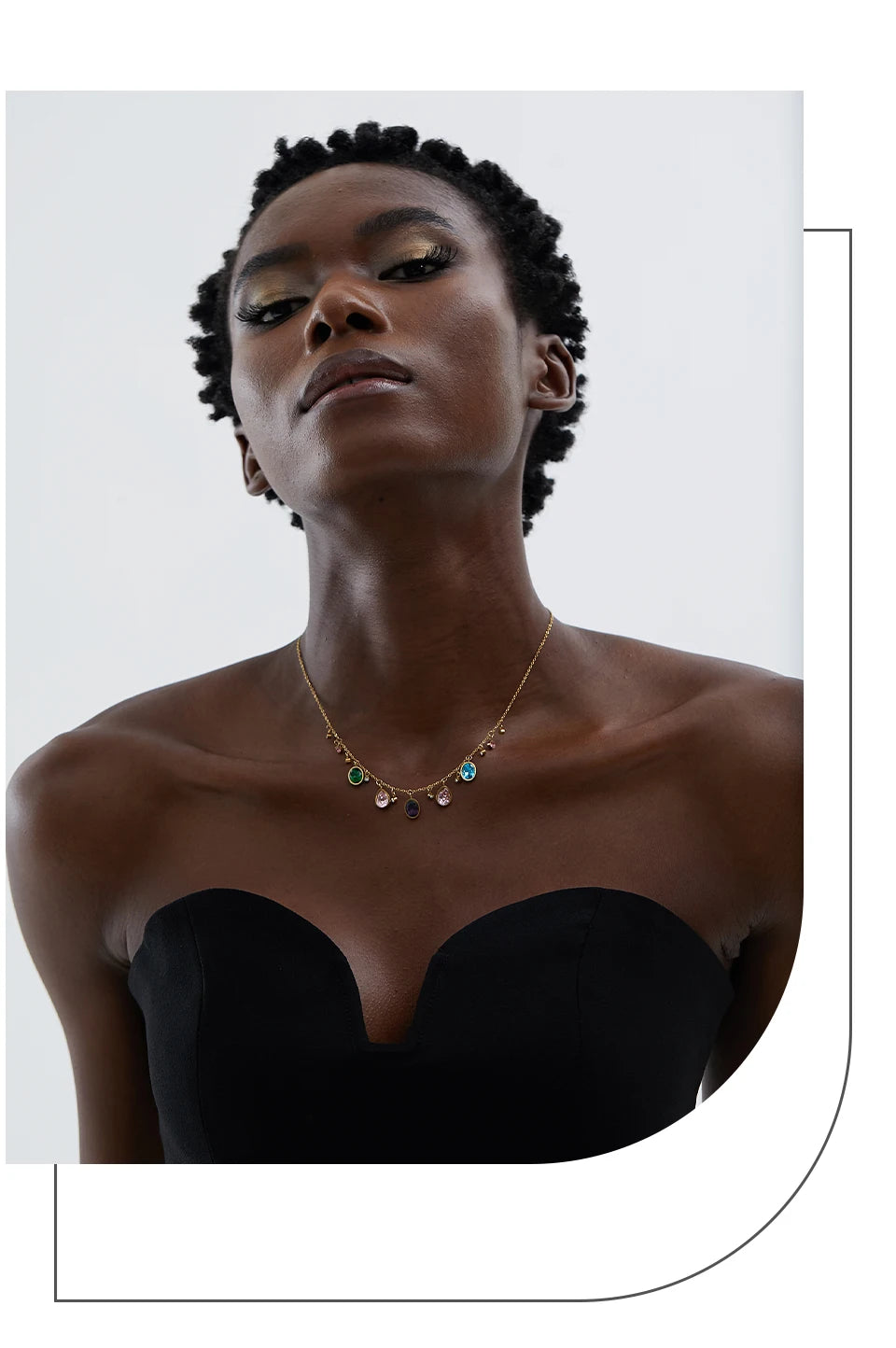 Cubic zirconia multi-color geometric necklace in gold-plated stainless steel with cubic zirconia.