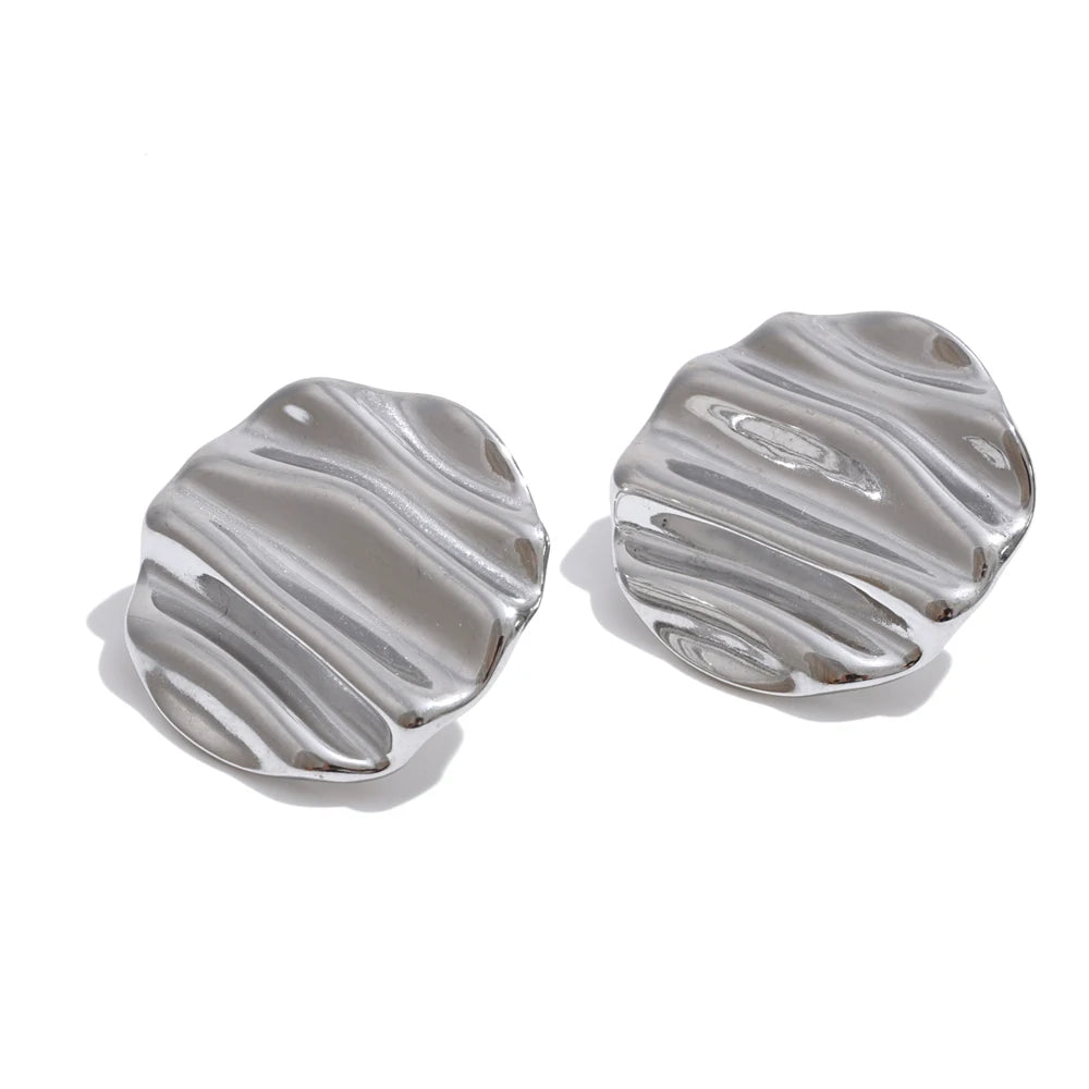 Geometric earrings in gold-plated stainless steel.