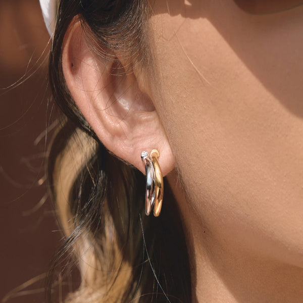 Two-Tone Twist Hoop Earrings — 18K Gold Plated · PA016