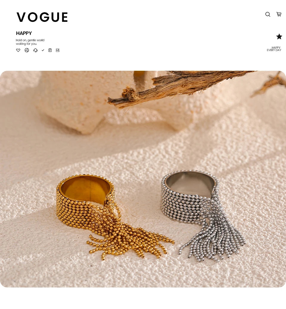 Geometric chain ring in 18K gold-plated stainless steel.