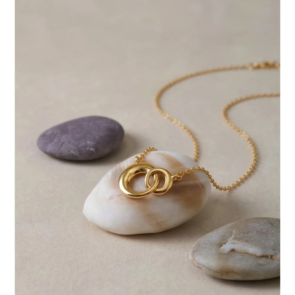 Coin geometric necklace in gold-plated stainless steel.