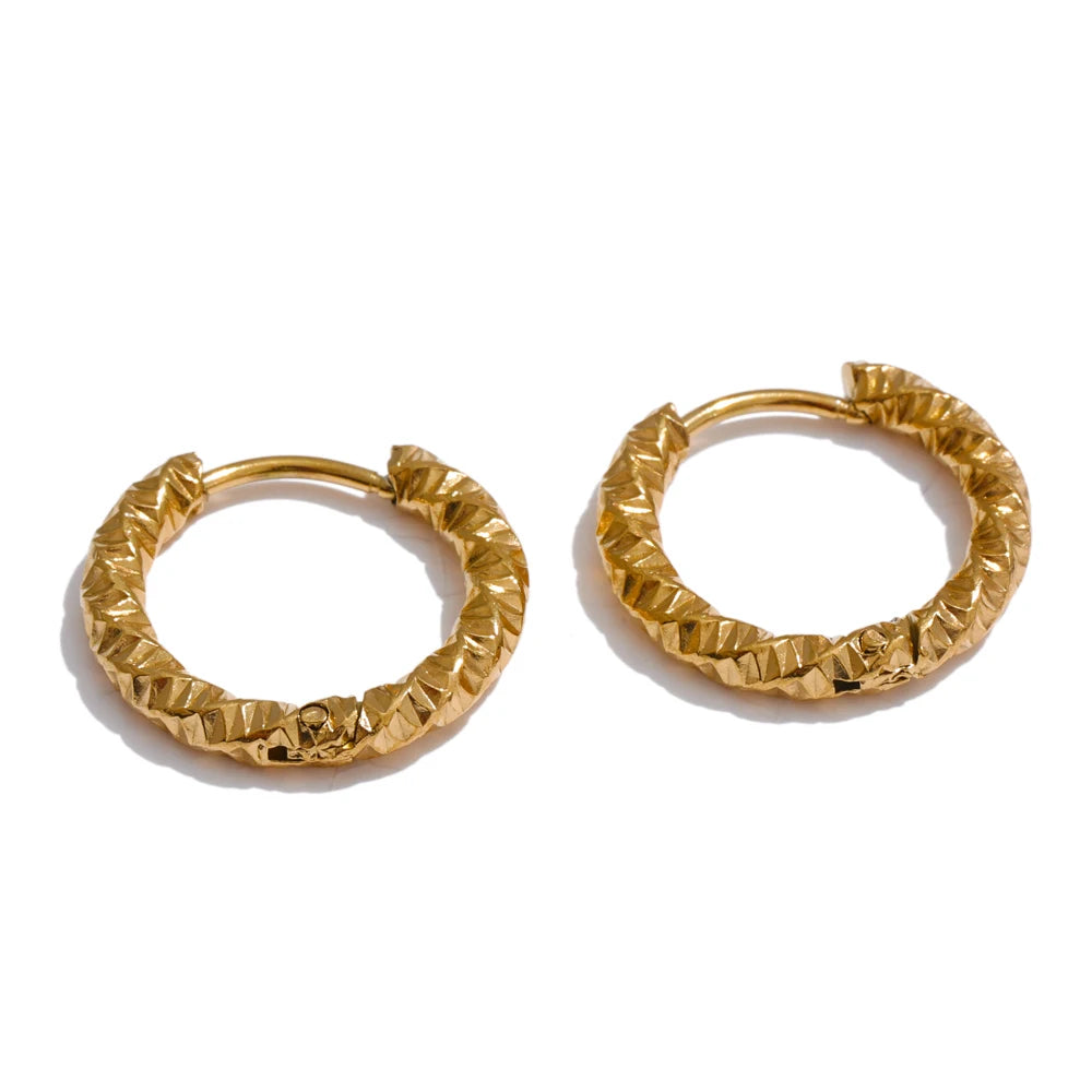 Geometric earrings in gold-plated stainless steel.
