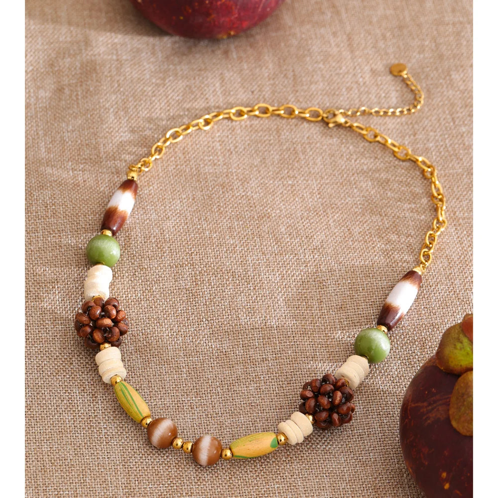 Beaded geometric chain necklace in gold-plated stainless steel.