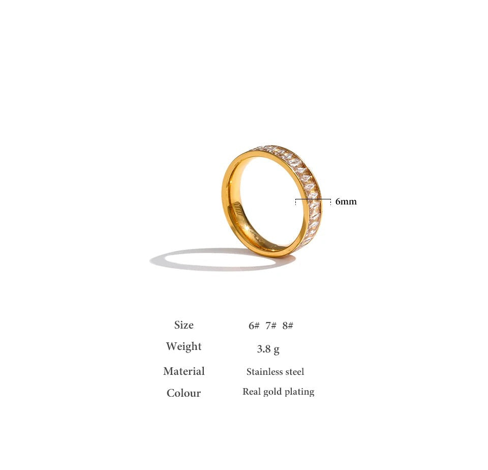 Cubic zirconia geometric ring in 18K gold-plated stainless steel with cubic zirconia.