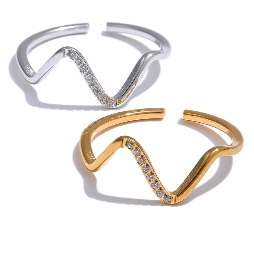 Gold-plated stainless steel ring with cubic zirconia accents.