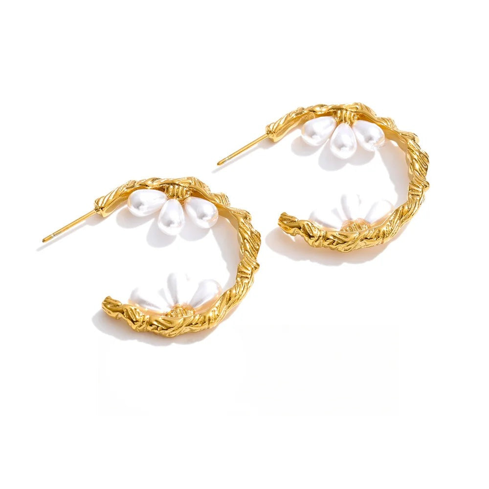 Gold-plated stainless steel earrings with pearl accents.