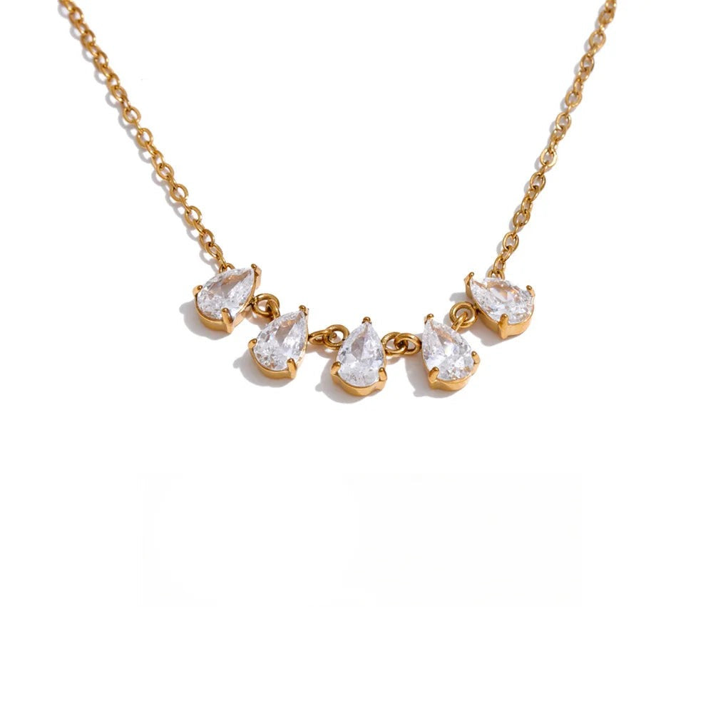 Gold-plated stainless steel necklace with cubic zirconia charms.