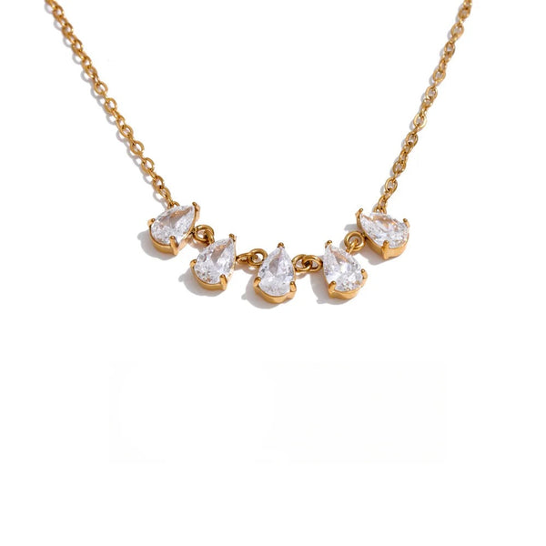 Gold-plated stainless steel necklace with cubic zirconia charms.