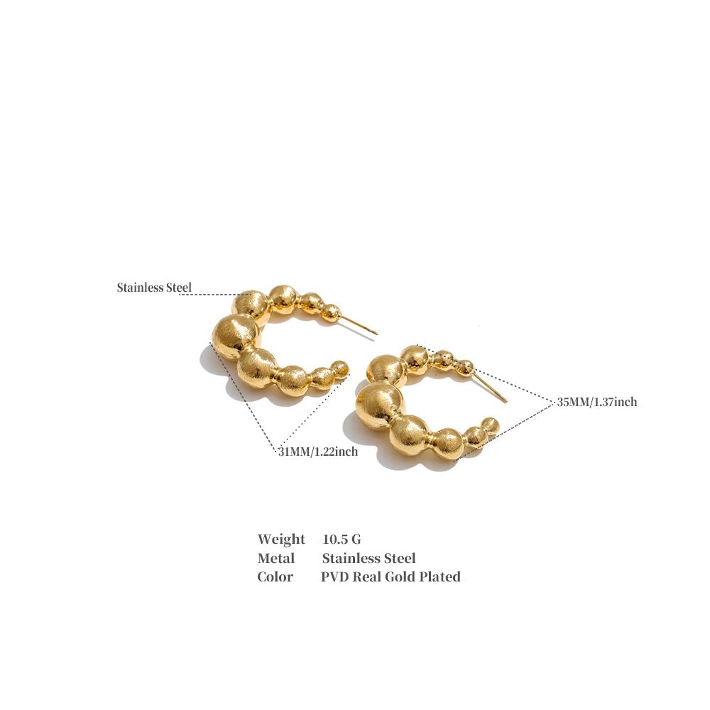 Beaded geometric earrings in gold-plated stainless steel.