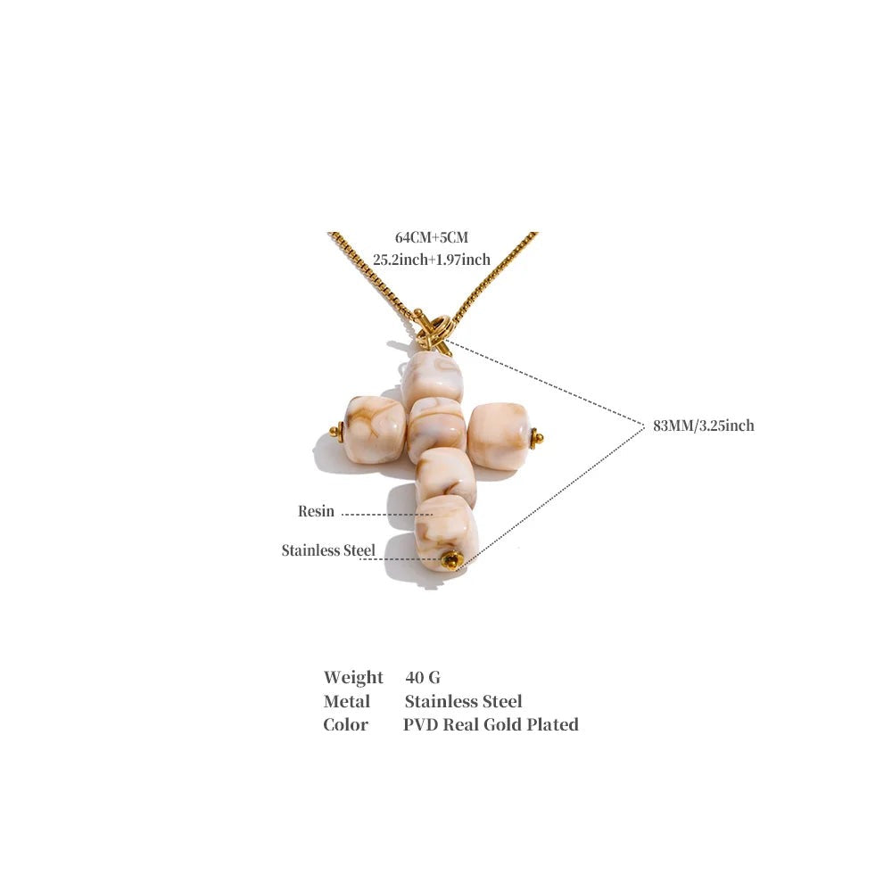 Resin acrylic cross necklace in gold-plated stainless steel with resin and acrylic.