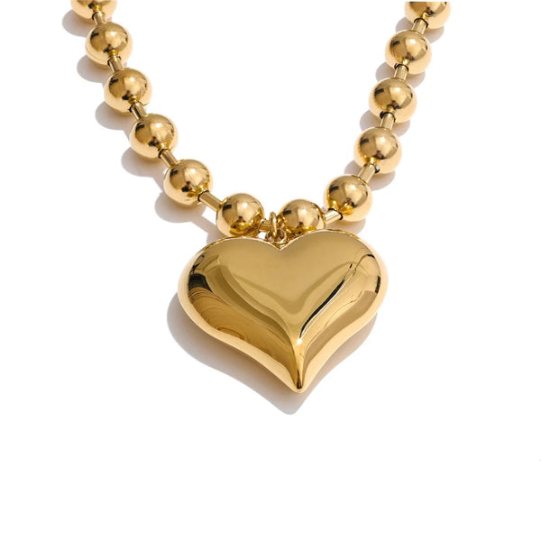 Gold-plated stainless steel necklace featuring a heart pendant.