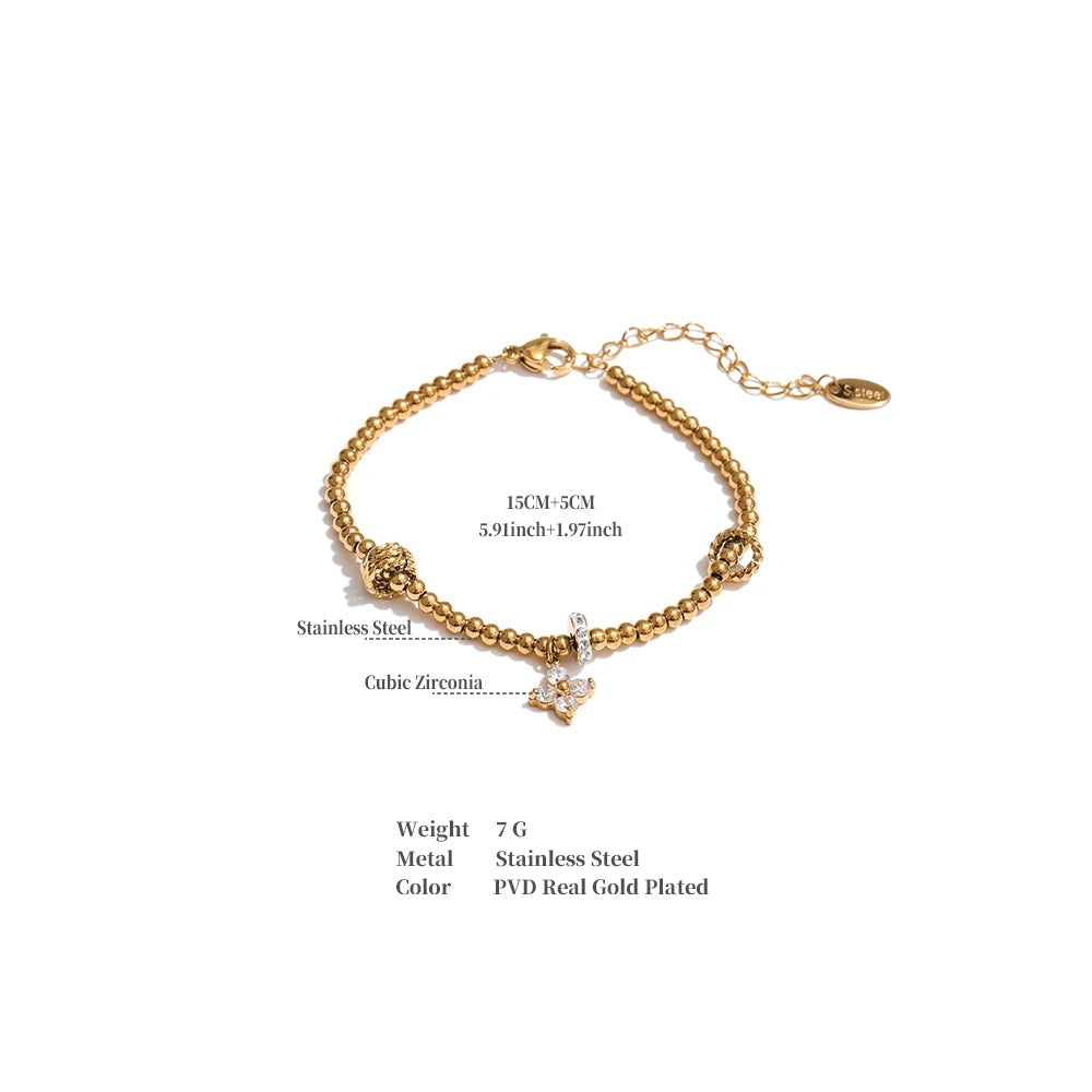 Cubic Zirconia Flower Beaded Bracelet — Gold-Plated Stainless Steel with Cubic Zirconia · PS1066