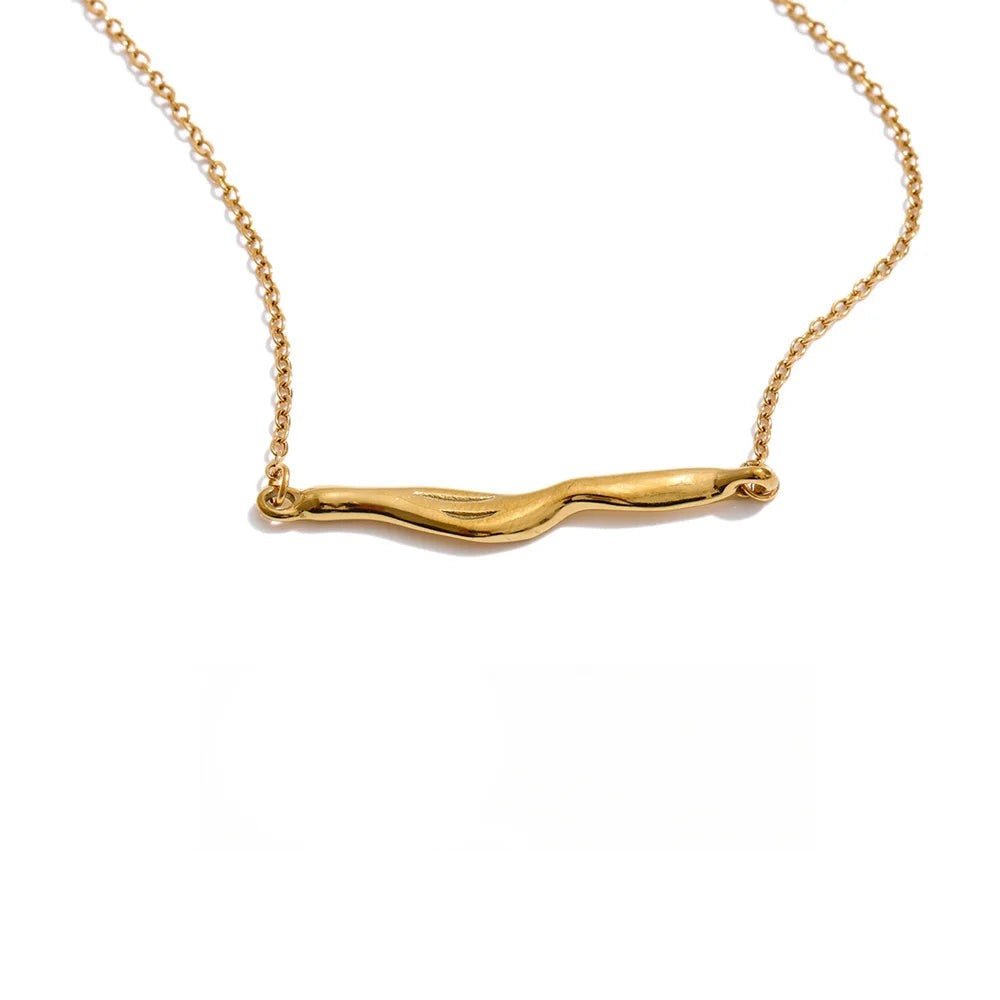 Stainless steel necklace with a gold chain and a curved pendant.