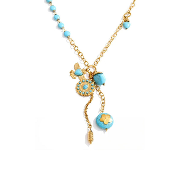 Gold-plated stainless steel necklace with turquoise stones and a blue flower pendant.