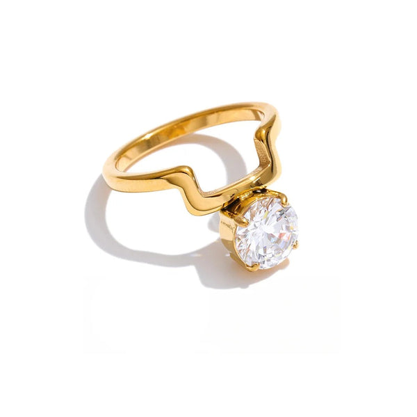Gold-plated stainless steel ring with cubic zirconia.